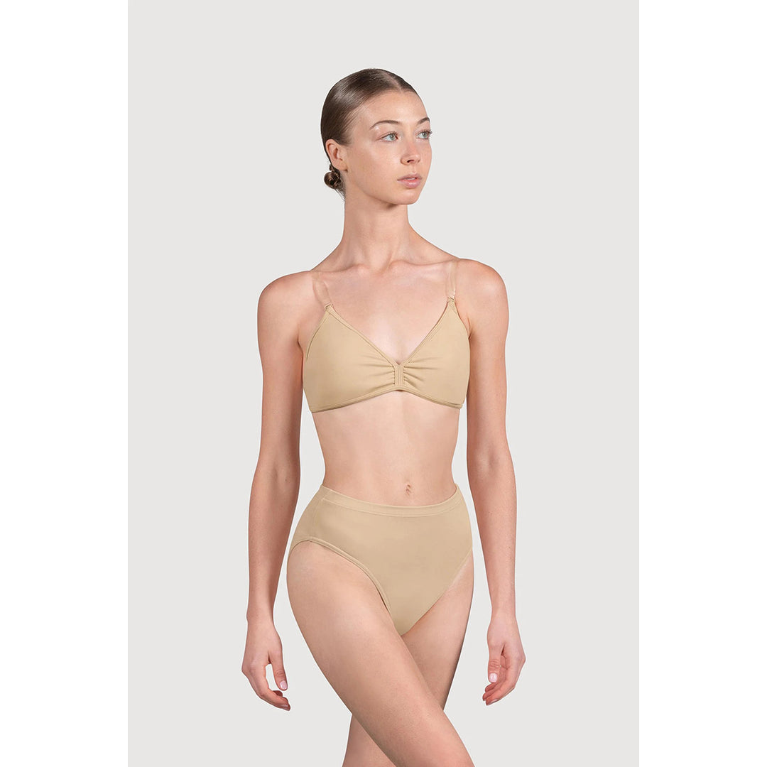 A model wearing a beige High Waist Womens Brief undergarment set with a twisted front detail on the top and high-waisted bottoms, photographed against a light gray studio background.