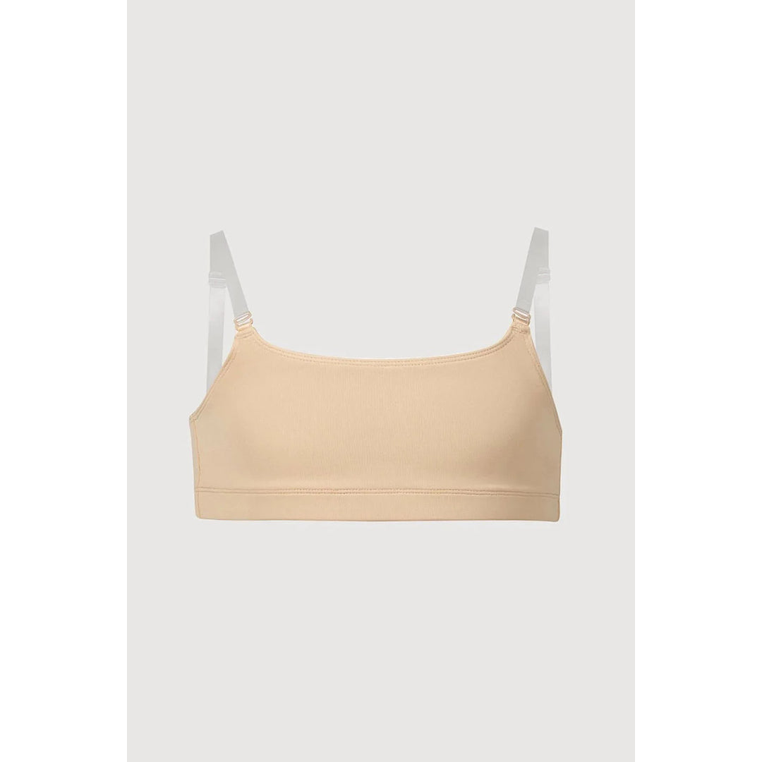 A light beige wireless bralette with thin adjustable shoulder straps, shown flat against a light gray background.