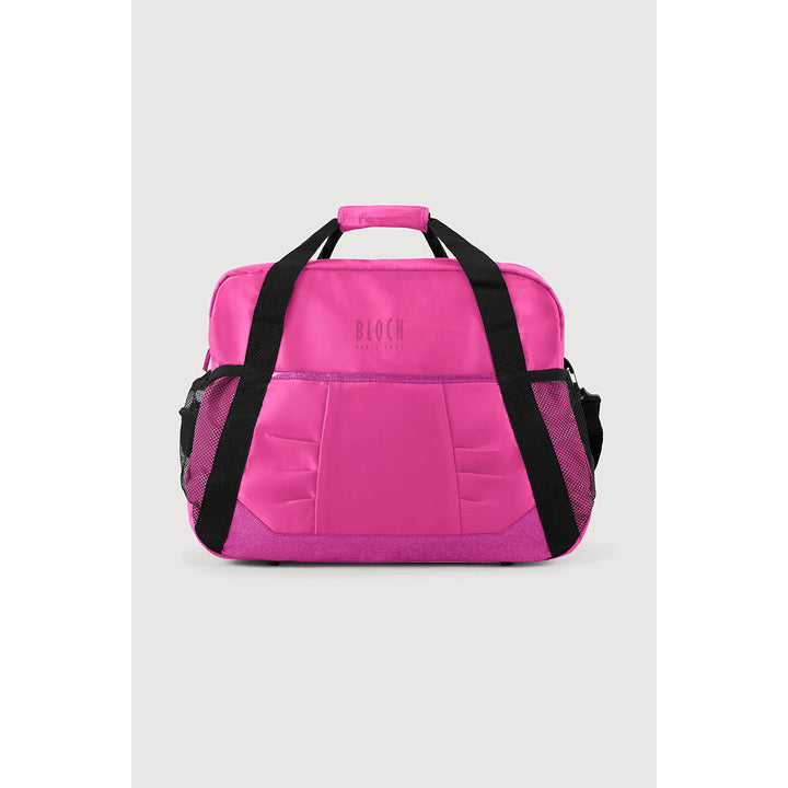 A bright pink duffel bag with black handles and side mesh pockets, featuring the brand name &