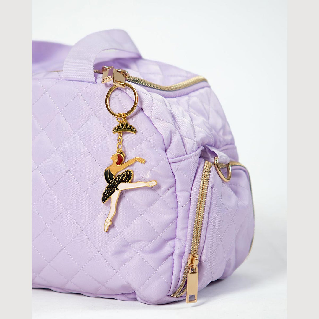 Energetiks Black Swan Lake key ring clipped onto a dance bag