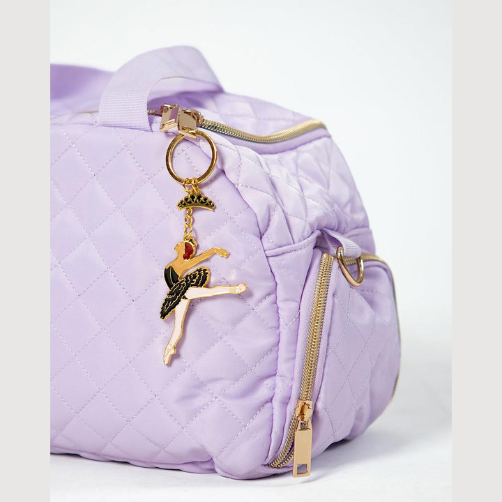 Energetiks Black Swan Lake key ring clipped onto a dance bag