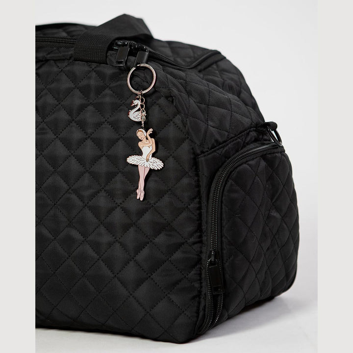 Energetiks White Swan Lake key ring hanging from a dance bag