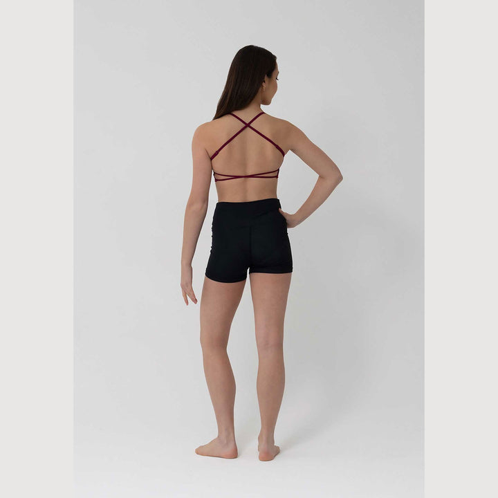 Studio 7 Dancewear Zella girls crop top in Mahogany, back view with criss-cross straps